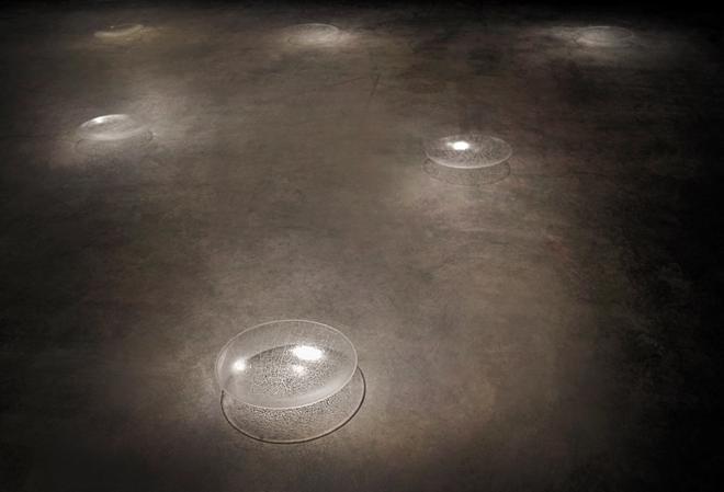 drops sculpture on floor